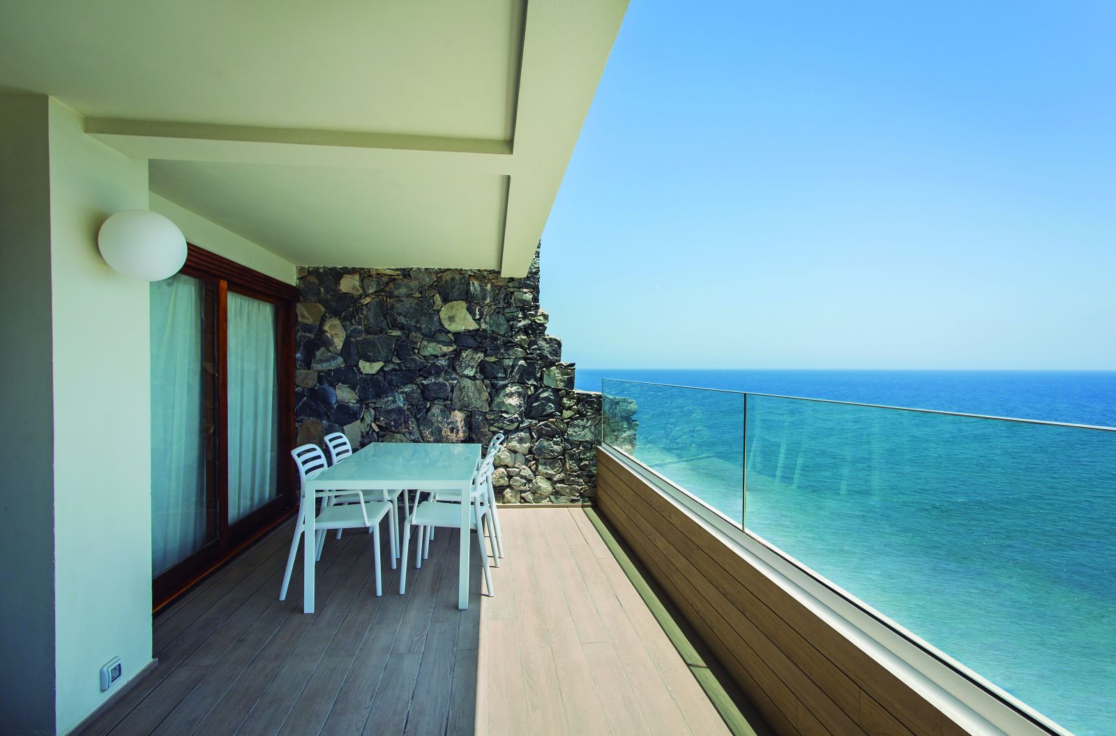 guarda corpo vidro laminado paisagem mar